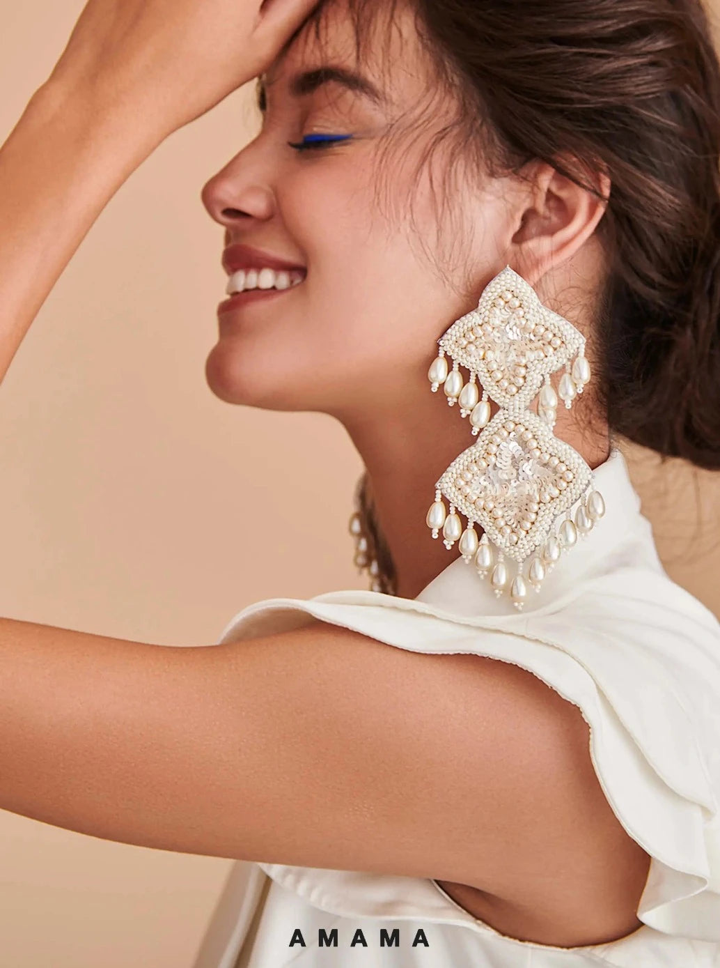 Scintillare by Sukkhi Delightful Rhodium-Toned Long Bow Western Earrings  for Women : Amazon.in: Jewellery